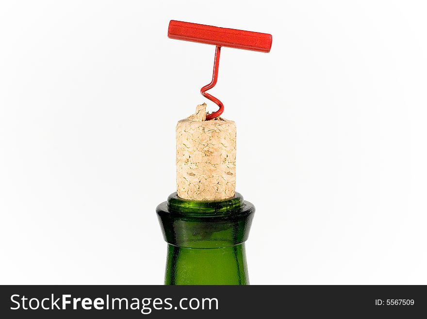Red bottle-screw, cork and green bottle. Red bottle-screw, cork and green bottle