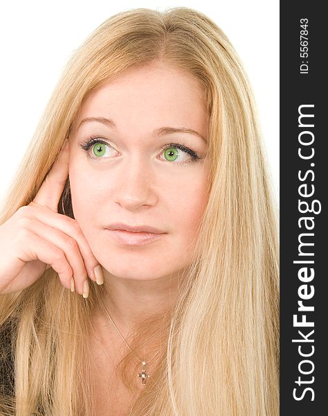 Close-up portrait of young attractive green-eyed woman on white background