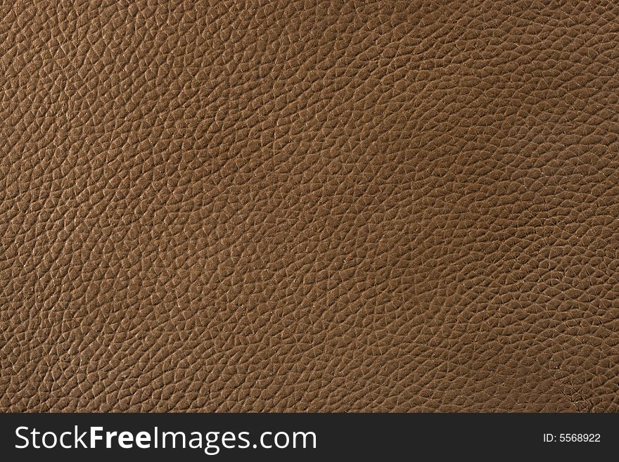 Natural qualitative brown leather texture. Close up. Natural qualitative brown leather texture. Close up.