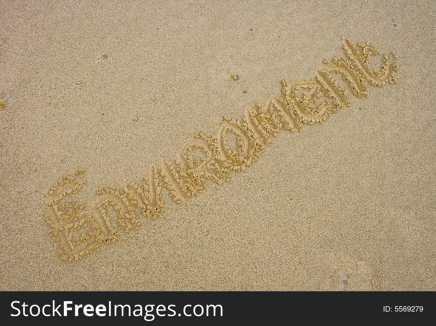 The word environement written in Sand