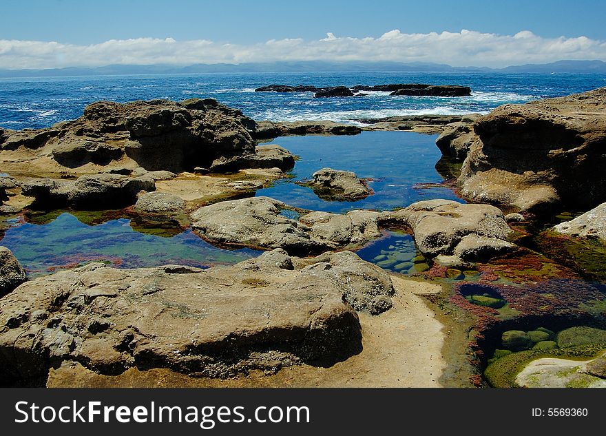 Sand rocks at the low tides on the west coast