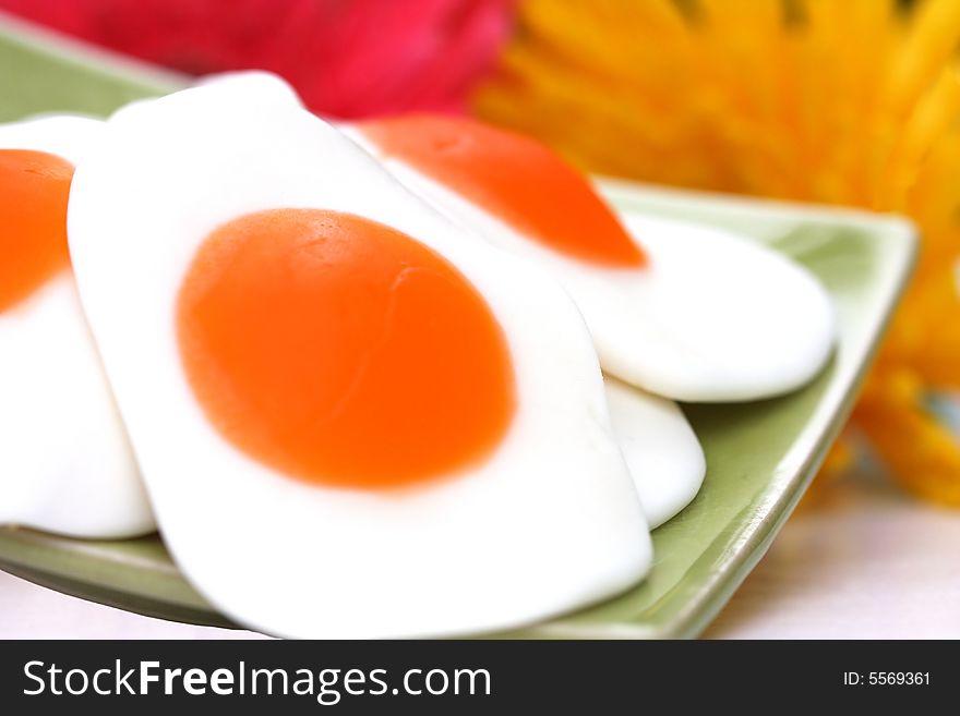 Gummi fryed eggs and flower close up