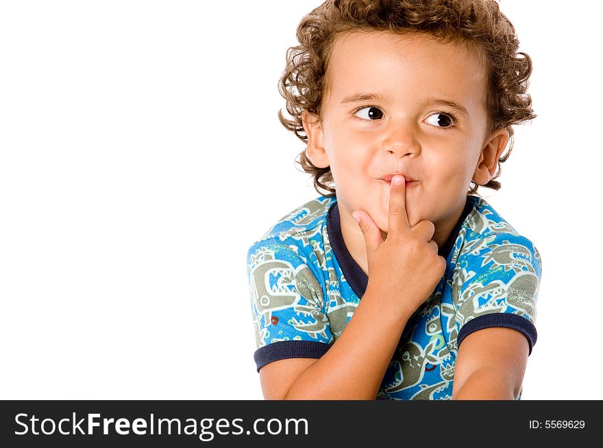 A cute young boy on white background