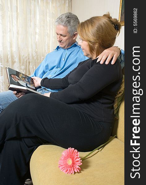 Couple Looking At Book - Horizontal