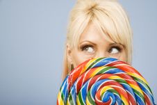 Woman With A Lollipop Royalty Free Stock Photography Woman With A Lollipop Royalty Free Stock Photography