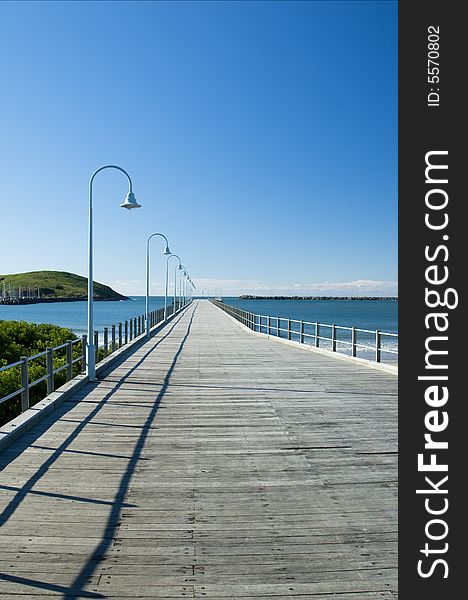 High angle of view of a historic wooden jetty and harbour