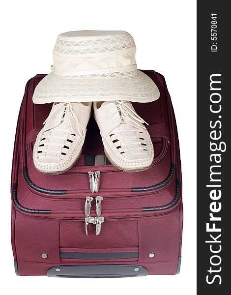 Shoes Pair and Hat on Bag Isolated over White