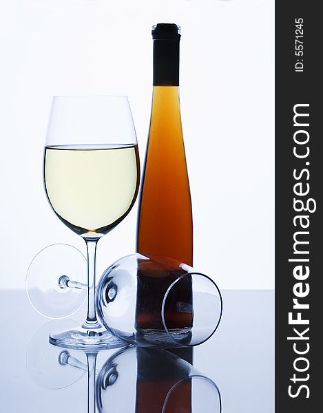 Two glasses and wine bottle