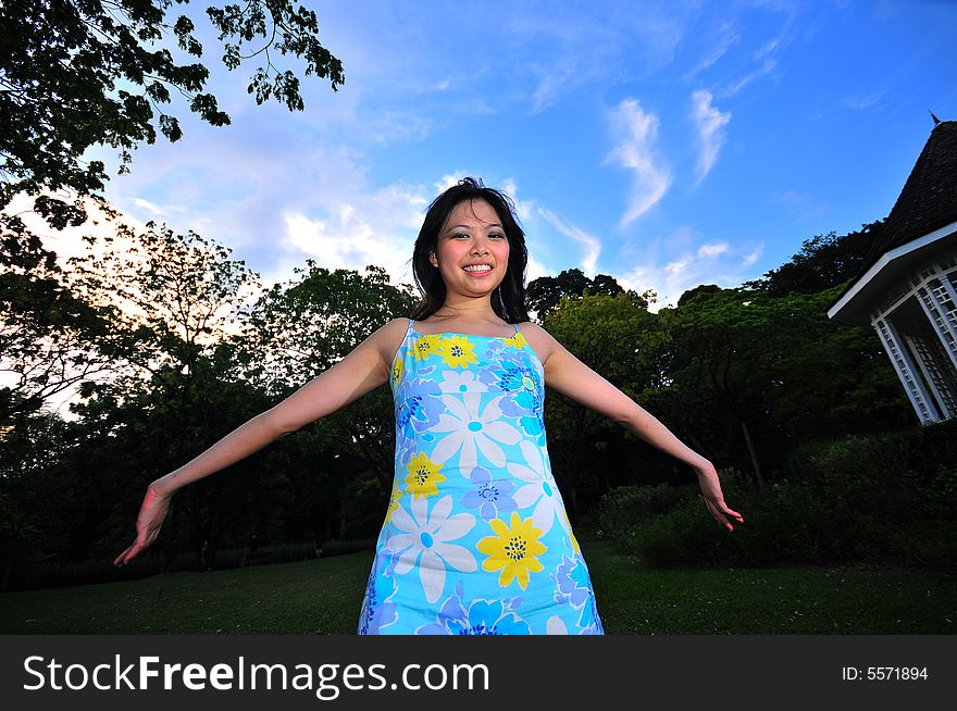 Picture of a Happy Girl out in the park. Indicative of mood, joyous occasion, promotion of healthy living and lifestyle. Picture of a Happy Girl out in the park. Indicative of mood, joyous occasion, promotion of healthy living and lifestyle.