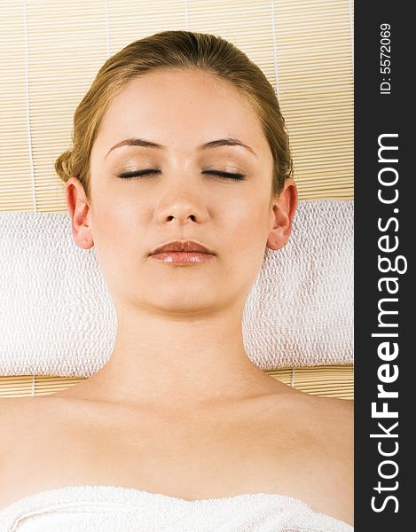 Relaxing woman in a spa