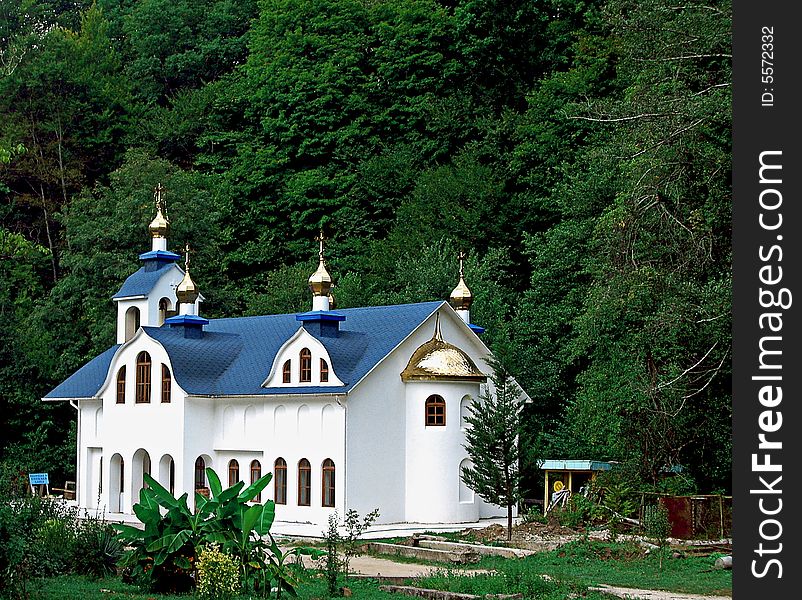 Photo of the building of christianity church in the forest