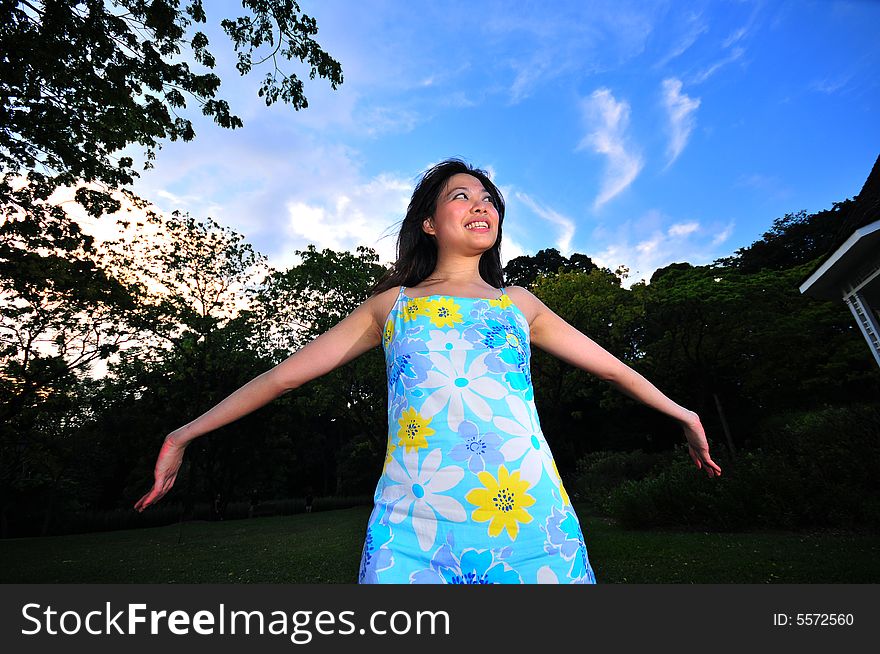 Picture of a Happy Girl out in the park. Indicative of mood, joyous occasion, promotion of healthy living and lifestyle. Picture of a Happy Girl out in the park. Indicative of mood, joyous occasion, promotion of healthy living and lifestyle.