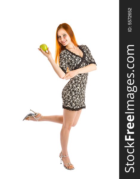 Red haired girl dancing with apple. Red haired girl dancing with apple