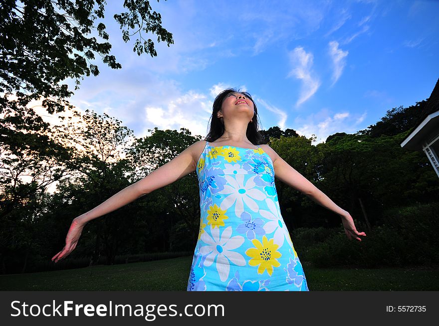 Picture of a Happy Girl out in the park. Indicative of mood, joyous occasion, promotion of healthy living and lifestyle. Picture of a Happy Girl out in the park. Indicative of mood, joyous occasion, promotion of healthy living and lifestyle.