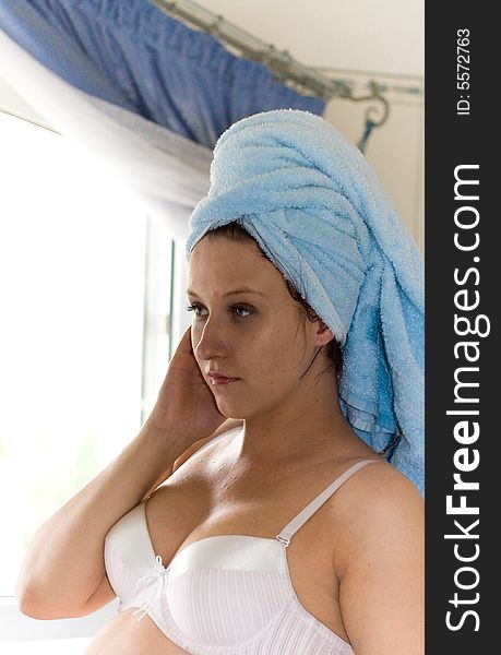 Woman with towel on head. Woman with towel on head