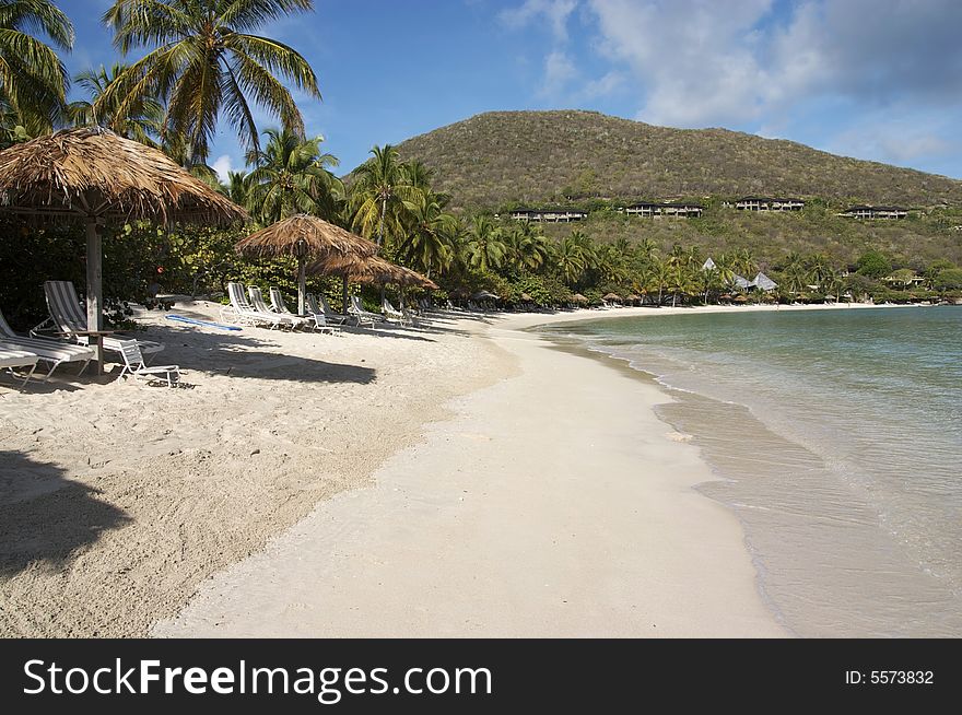 A view of a peaceful island beach resort.