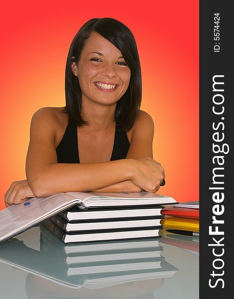 Young female student on colored background