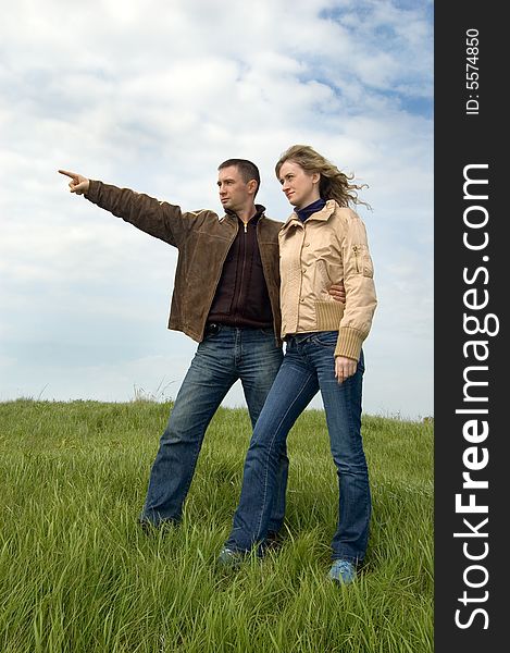 Guy and girl on a spring field. Guy and girl on a spring field