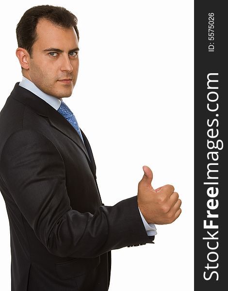 Portrait of a young attractive businessman giving the thumbs-up sign. Portrait of a young attractive businessman giving the thumbs-up sign