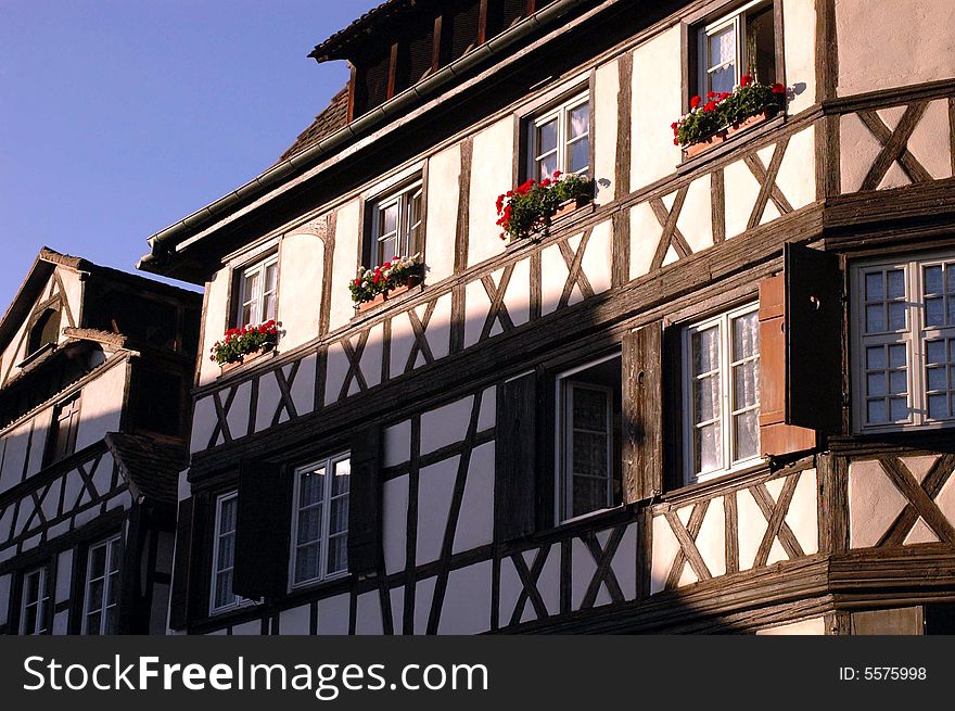 A traditional half-timbered house in Strasbourg in the region of Alsace, France. A traditional half-timbered house in Strasbourg in the region of Alsace, France.