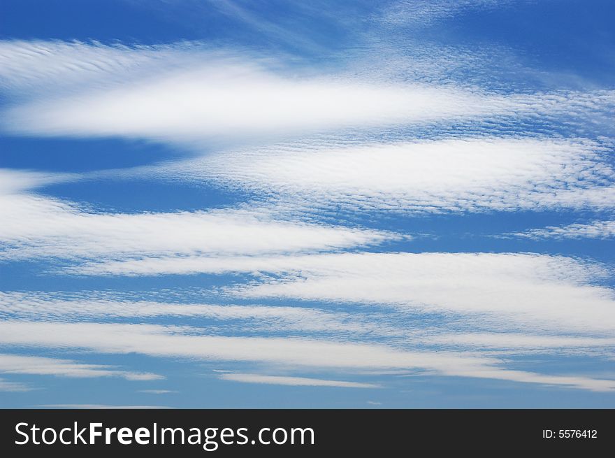 White clouds in a blue sky.  Great background. White clouds in a blue sky.  Great background