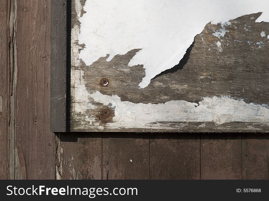 An old and rotten wooden building. An old and rotten wooden building