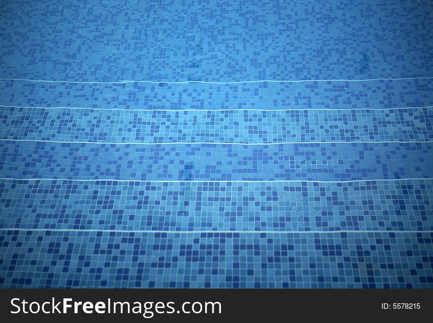 Swimming pool with water reflections