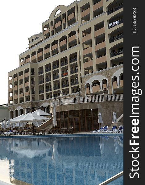 Swimming pool side with chairs