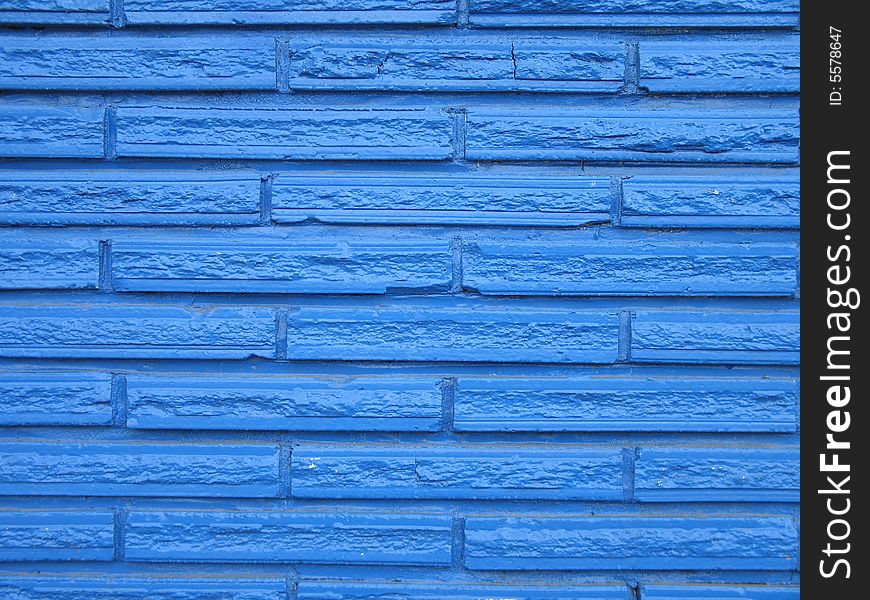 A blue brick wall background texturized