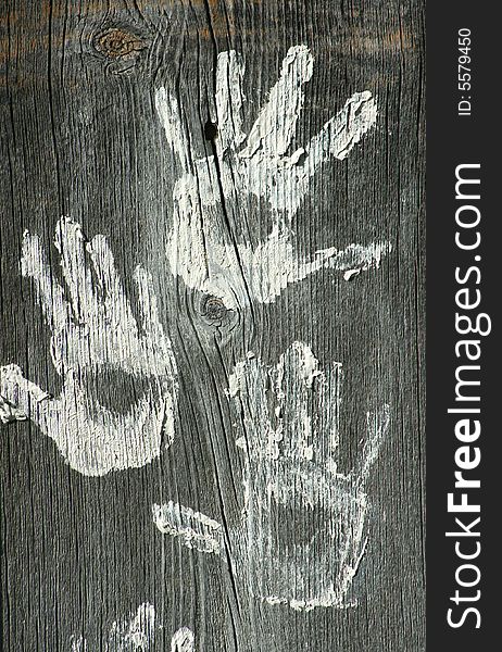 Handprints in Paint on Weathered Wood. Handprints in Paint on Weathered Wood