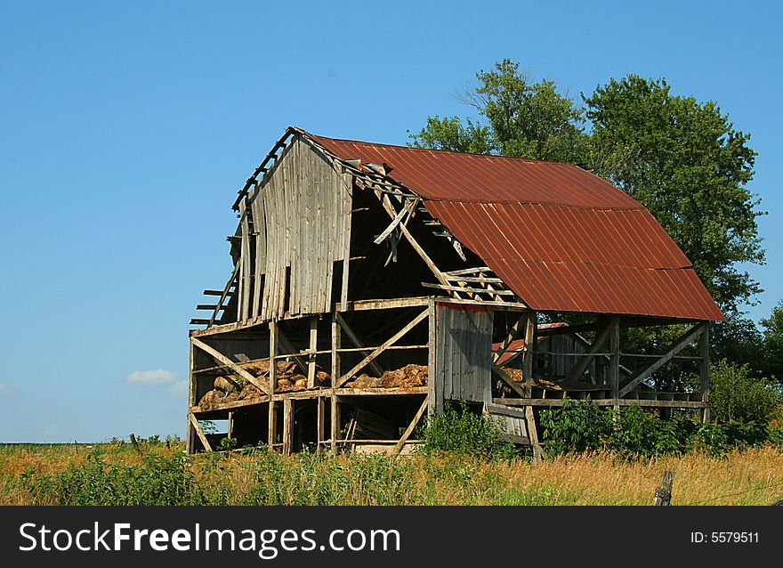 Broken Down Hay Barn in an Iowa Field. Broken Down Hay Barn in an Iowa Field