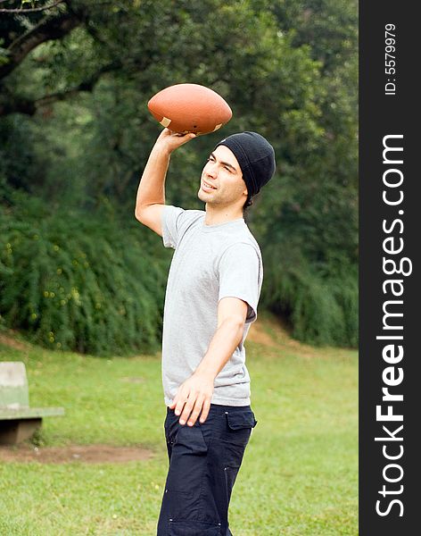 Man Throwing Football - vertical