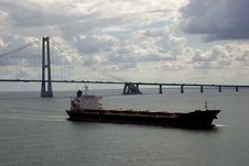 Cargo Ship, Having Just Passed Under A Bridge Royalty Free Stock Photo Cargo Ship, Having Just Passed Under A Bridge Royalty Free Stock Photo