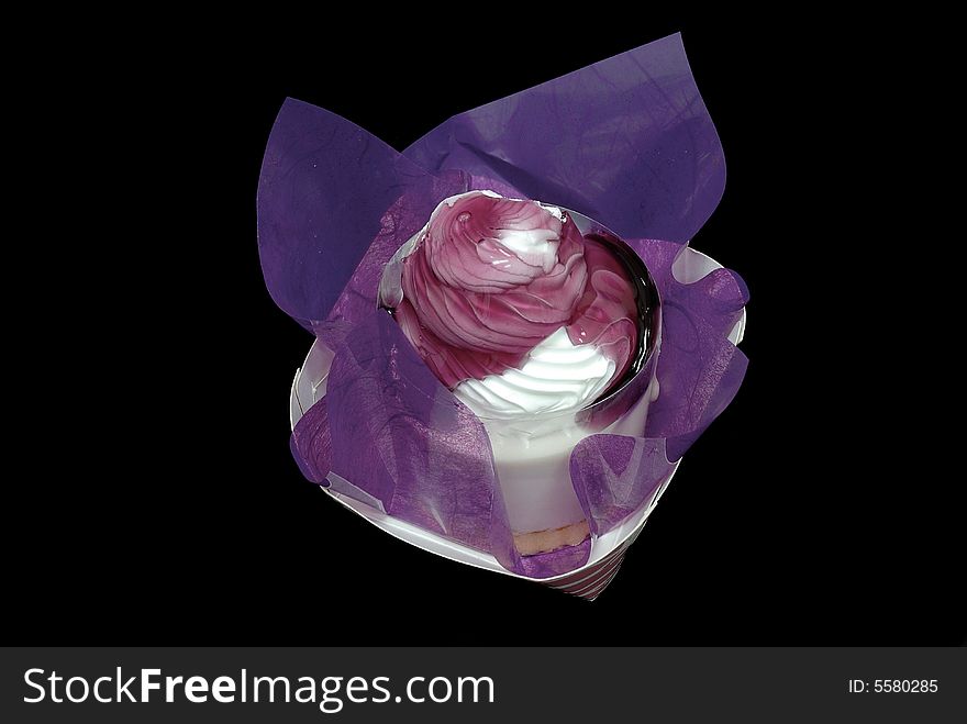 Isolsted cake on black background. Isolsted cake on black background