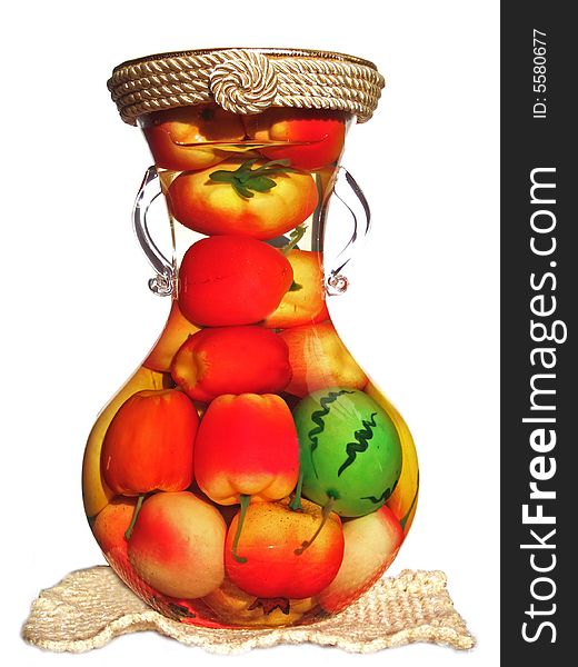 A fruit pot with Watermelons, apples, lemons, potatos in it.