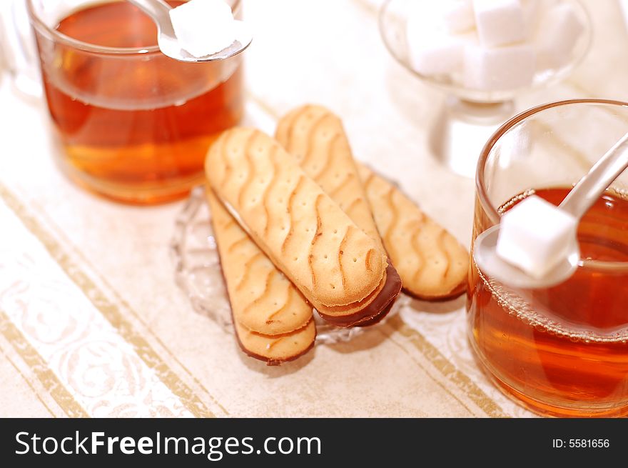 Table set for tea with sweet cookies