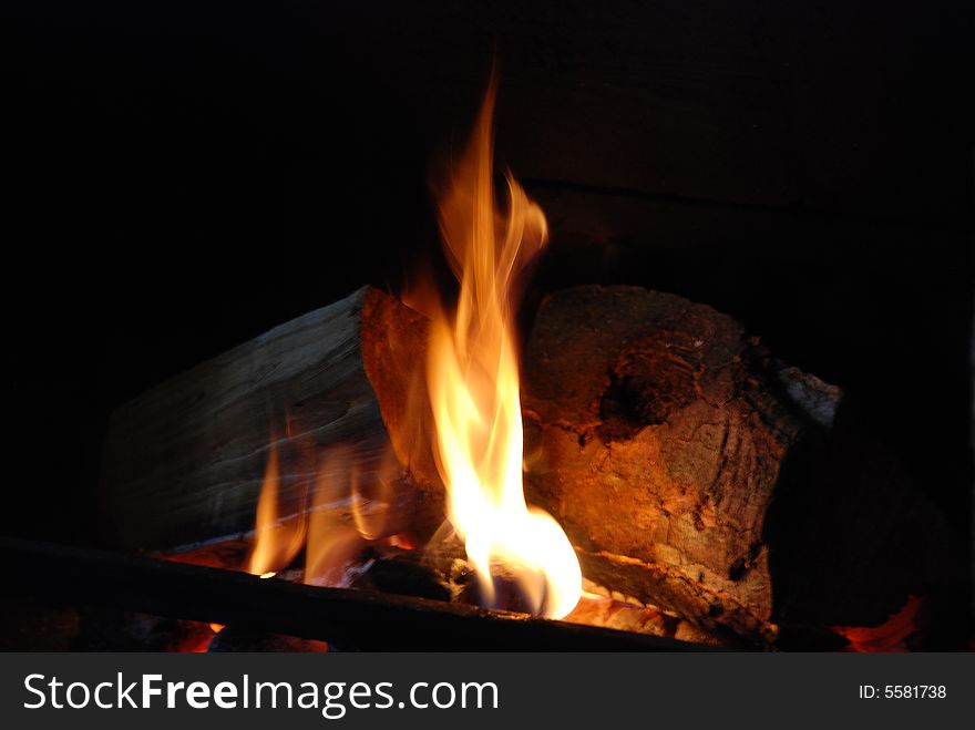 Log fire burning at night