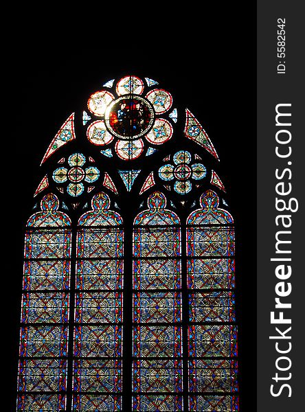 Stained-glass window. Notre Dame Cathedral. Paris, France