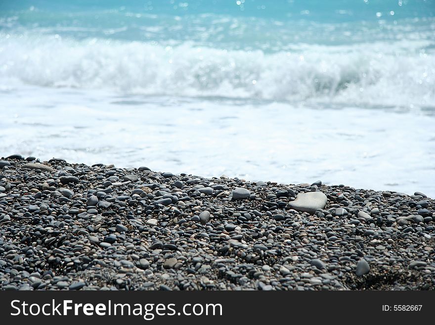 Stones and sea waves