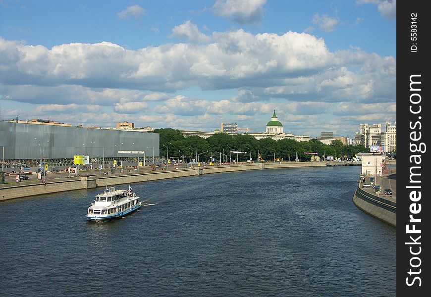 Quay on river  in city center at summer