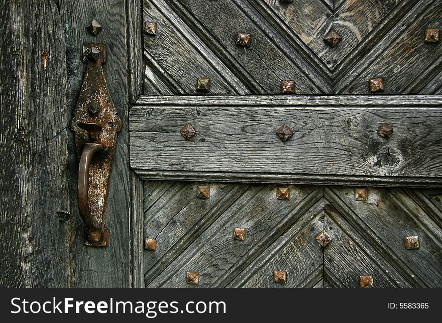 Old door with a lock close up