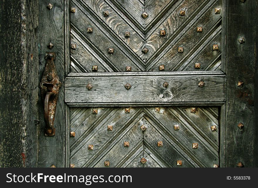 Old door with a lock close up