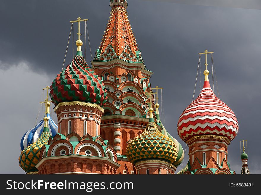 Cupolas and domes of Church of desposition of Saint Virgin's Rone also known as Satin Basil's Cathedral of Red Suqre in Moscow, Russia. Cupolas and domes of Church of desposition of Saint Virgin's Rone also known as Satin Basil's Cathedral of Red Suqre in Moscow, Russia