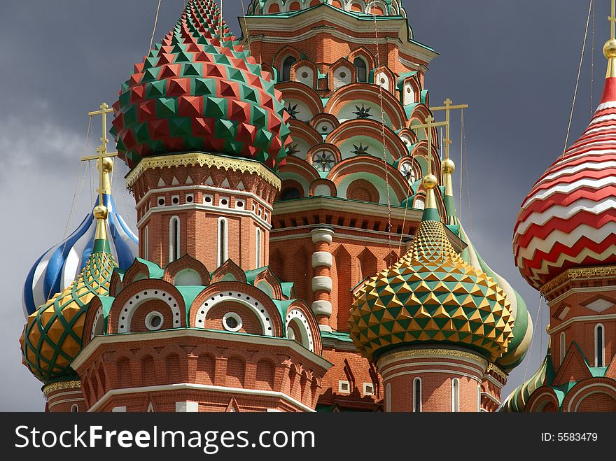 Cupolas and domes of Church of desposition of Saint Virgin's Rone also known as Satin Basil's Cathedral of Red Suqre in Moscow, Russia. Cupolas and domes of Church of desposition of Saint Virgin's Rone also known as Satin Basil's Cathedral of Red Suqre in Moscow, Russia