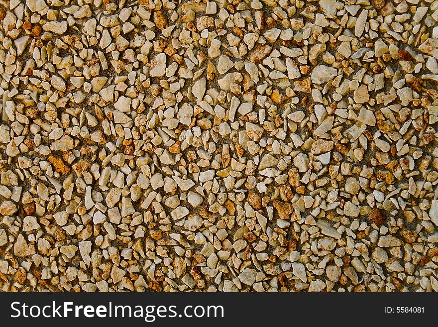 Gravel with cement in the wall