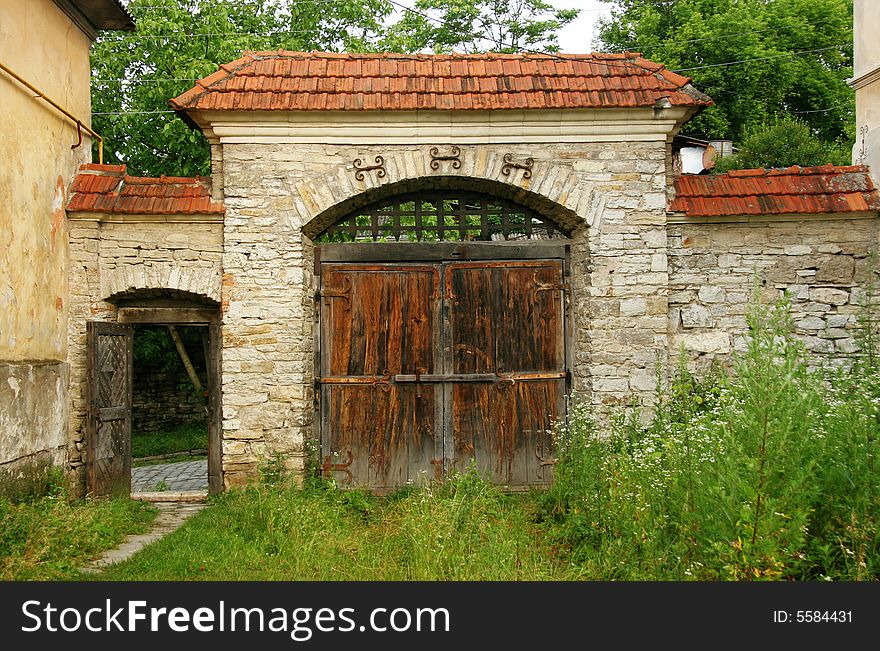 Old wooden gate in a court yard of the old city of Kamenets Podolsk Ukraine