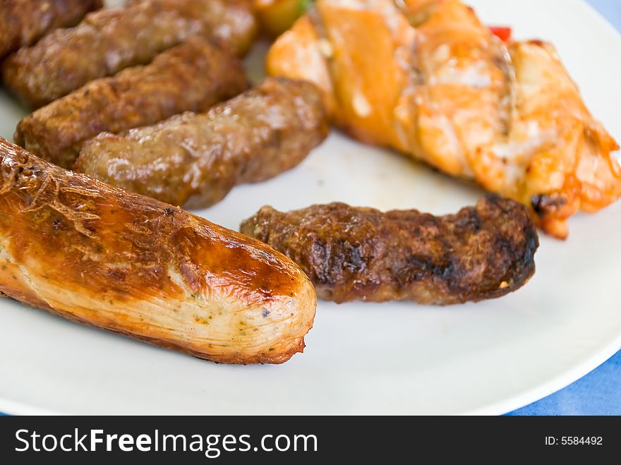 Fresh barbecue with mixed meat.