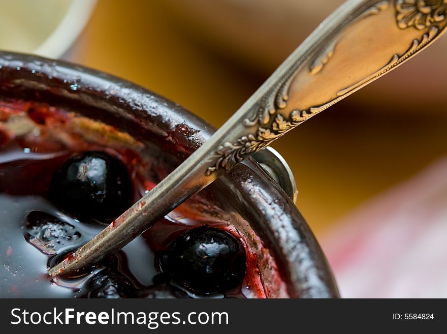 Bowl with berries and a spoon