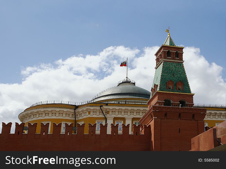 Russian flag over government building behind Kremlin wall. Russian flag over government building behind Kremlin wall