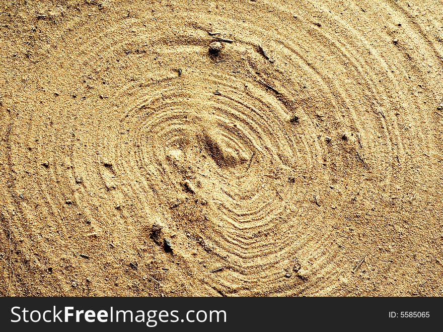 Background with circle in the sand
